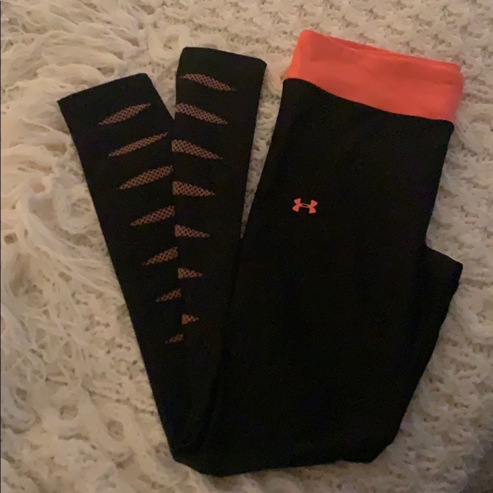 Black and pink Under Armour cold gear leggings.